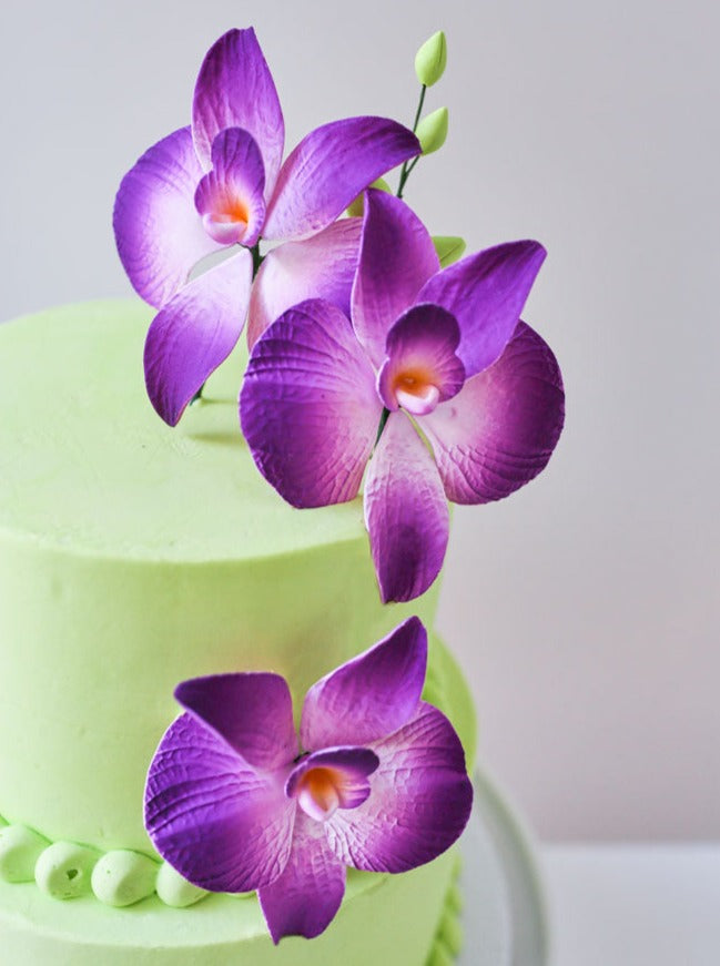 colorful orchid cake topper