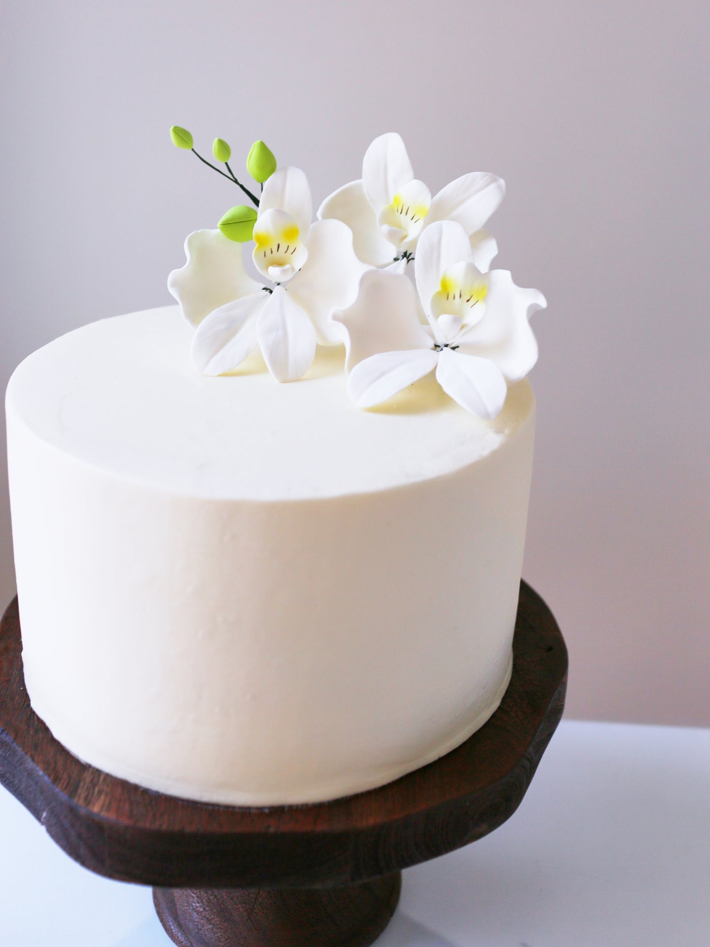 white orchid cake topper